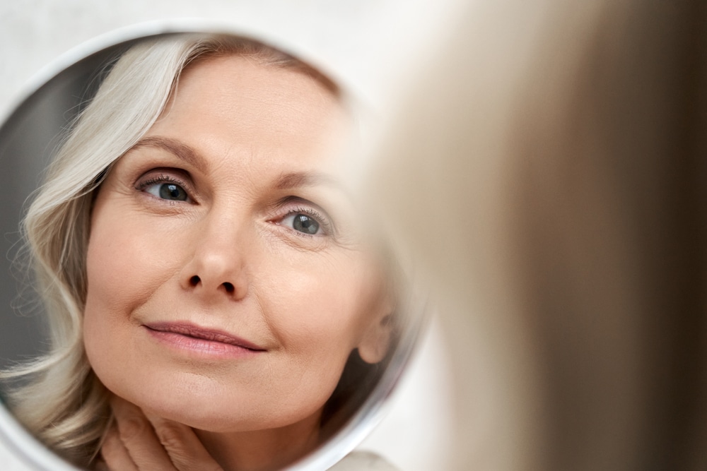 Mature woman over 60 with facial fillers