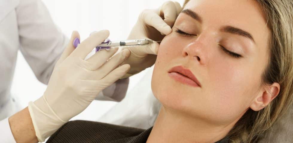 Woman gets hyaluronic acid injection for beautiful skin