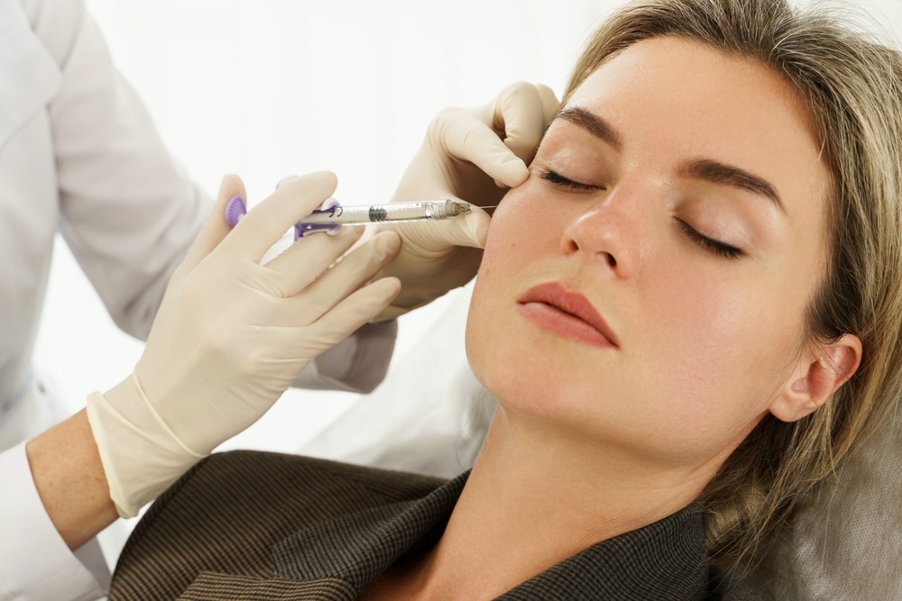 Woman gets hyaluronic acid injection for beautiful skin